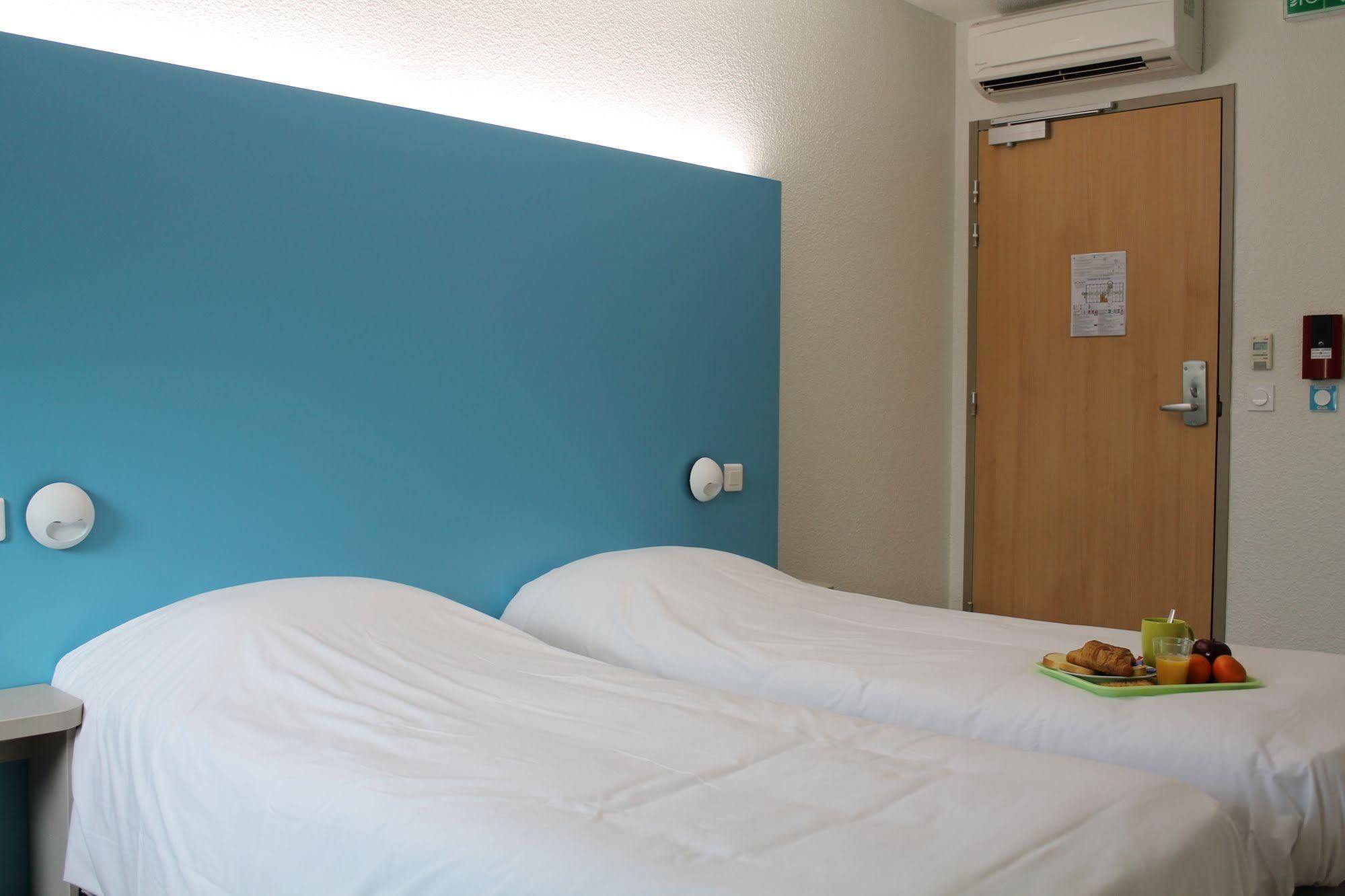 First Inn Hotel Paris Sud Les Ulis Exterior photo